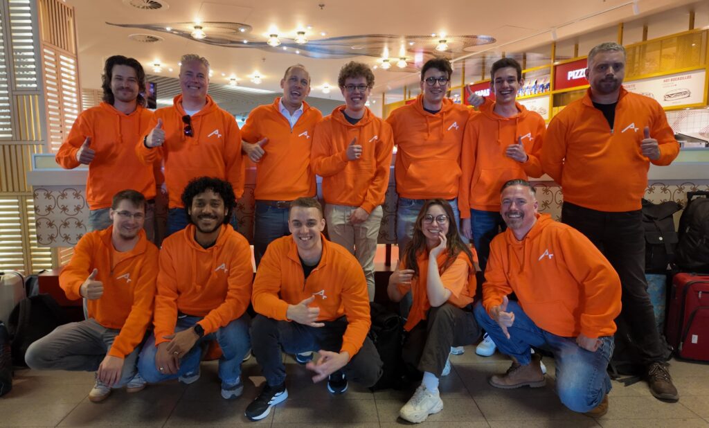 The ApplicationLink team in orange hoodies at Kaseya Connect Europe 2026 in Prague.